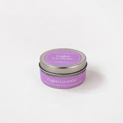 English Lavender soy wax candle in a purple tin on a white background